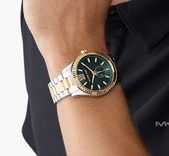 Michael Kors Herren Uhr ''Lexington'' (Multifunktionswerk, Edelstahl, Bicolor) für 89,40€ inkl. Versand (statt 149€)

