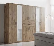 Modern Living Drehtürenschrank ''Dillingen'' in Eichefarben (270/208/58 cm) für 628€ inkl. Versand (statt 946€) 