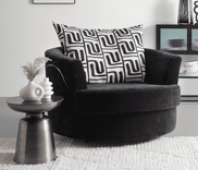 Premium Living Designsessel Cabona - drehbar, Strukturstoff in Schwarz für 636,44€ inkl. Versand (statt 950€)
