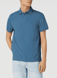 Hot! Tommy Hilfiger Poloshirt mit Label-Stitching (vers. Farben) für 29,99€ inkl. Versand (statt 45€)